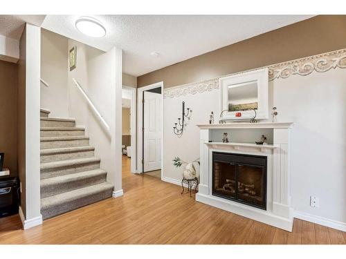 130 Hidden Valley Crescent Nw, Calgary, AB - Indoor With Fireplace