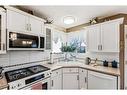 130 Hidden Valley Crescent Nw, Calgary, AB  - Indoor Photo Showing Kitchen 