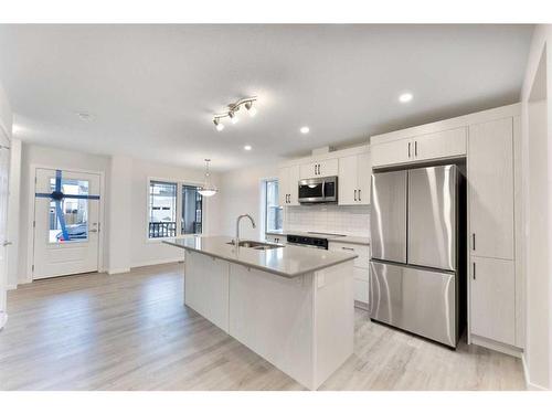 1017 Southwinds Greens Sw, Airdrie, AB - Indoor Photo Showing Kitchen With Stainless Steel Kitchen