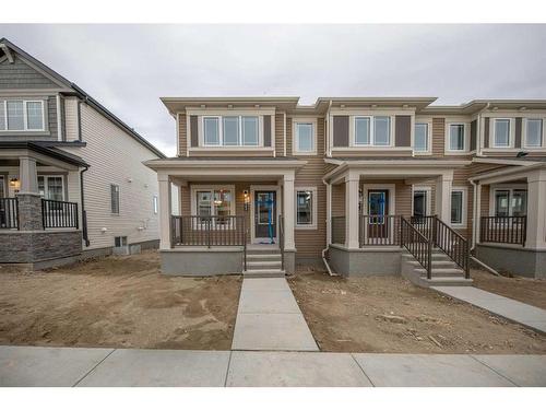 1017 Southwinds Greens Sw, Airdrie, AB - Outdoor With Deck Patio Veranda With Facade