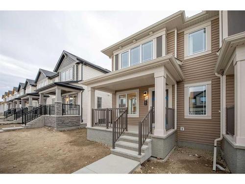 1017 Southwinds Greens Sw, Airdrie, AB - Outdoor With Deck Patio Veranda With Facade