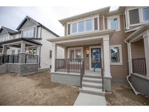 1017 Southwinds Greens Sw, Airdrie, AB - Outdoor With Deck Patio Veranda With Facade