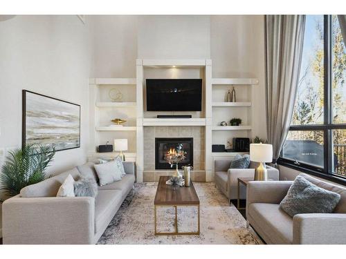 65 Springborough Boulevard Sw, Calgary, AB - Indoor Photo Showing Living Room With Fireplace