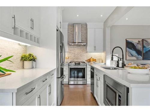 44 Windford Park Sw, Airdrie, AB - Indoor Photo Showing Kitchen With Upgraded Kitchen