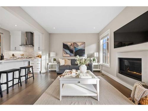 44 Windford Park Sw, Airdrie, AB - Indoor Photo Showing Living Room With Fireplace