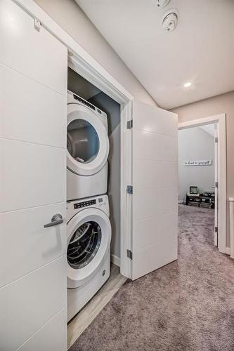 821 Sage Meadows Gardens Nw, Calgary, AB - Indoor Photo Showing Laundry Room