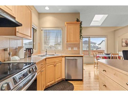 144 Oakmere Place, Chestermere, AB - Indoor Photo Showing Kitchen With Double Sink