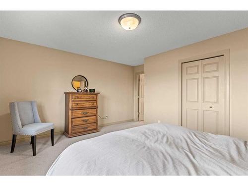 144 Oakmere Place, Chestermere, AB - Indoor Photo Showing Bedroom