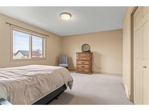 144 Oakmere Place, Chestermere, AB - Indoor Photo Showing Bedroom