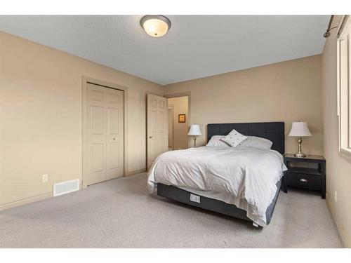 144 Oakmere Place, Chestermere, AB - Indoor Photo Showing Bedroom