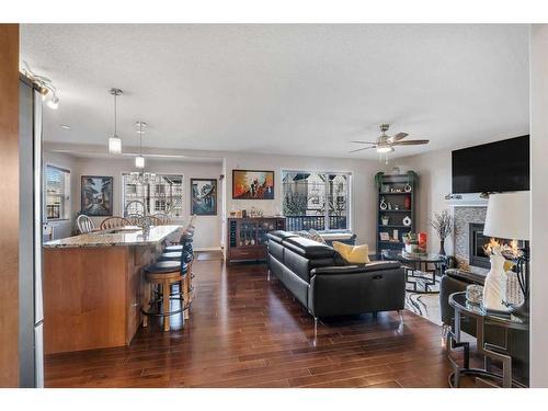 157 Sherwood Circle Nw, Calgary, AB - Indoor Photo Showing Other Room With Fireplace