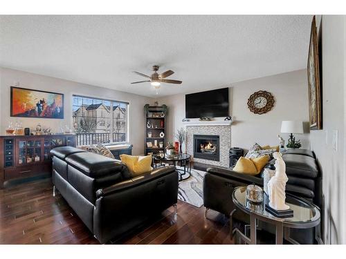 157 Sherwood Circle Nw, Calgary, AB - Indoor Photo Showing Living Room With Fireplace