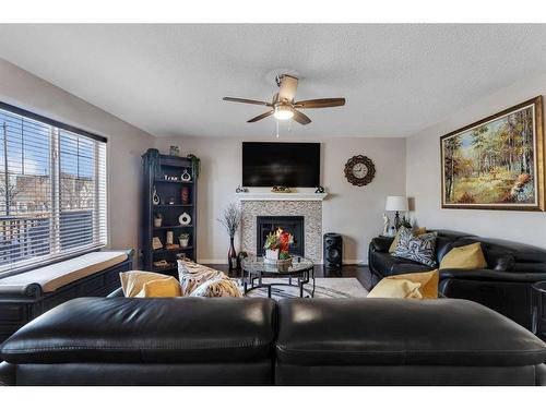 157 Sherwood Circle Nw, Calgary, AB - Indoor Photo Showing Living Room With Fireplace