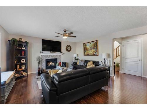 157 Sherwood Circle Nw, Calgary, AB - Indoor Photo Showing Living Room With Fireplace