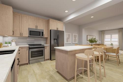 55-437 Alpine Avenue Sw, Calgary, AB - Indoor Photo Showing Kitchen With Double Sink