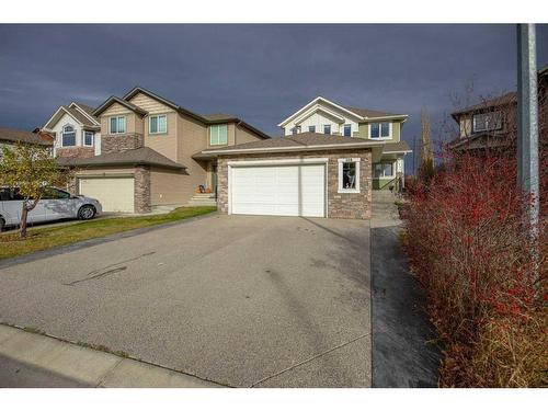 108 West Pointe Manor, Cochrane, AB - Outdoor With Facade