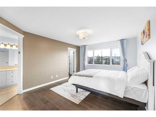 108 West Pointe Manor, Cochrane, AB - Indoor Photo Showing Bedroom