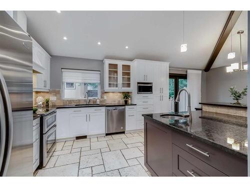 11 Woodlark Drive Sw, Calgary, AB - Indoor Photo Showing Kitchen With Stainless Steel Kitchen With Upgraded Kitchen