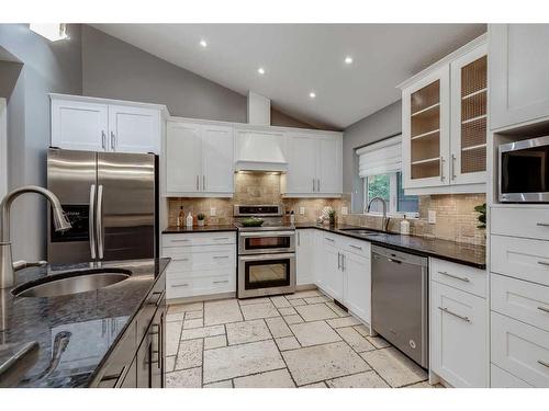 11 Woodlark Drive Sw, Calgary, AB - Indoor Photo Showing Kitchen With Stainless Steel Kitchen With Upgraded Kitchen