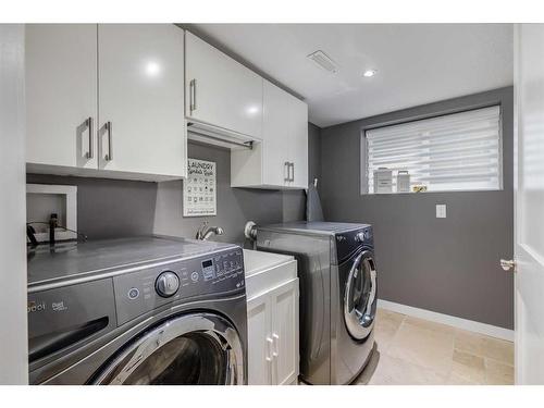 11 Woodlark Drive Sw, Calgary, AB - Indoor Photo Showing Laundry Room