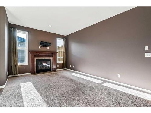 113 Brightoncrest Grove Se, Calgary, AB - Indoor With Fireplace