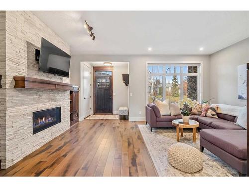 4512 16A Street Sw, Calgary, AB - Indoor Photo Showing Living Room With Fireplace