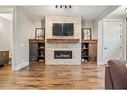 4512 16A Street Sw, Calgary, AB - Indoor Photo Showing Living Room With Fireplace