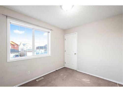 69 Saddlecreek Terrace Ne, Calgary, AB - Indoor Photo Showing Other Room