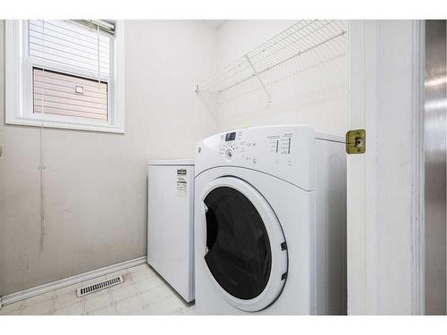 69 Saddlecreek Terrace Ne, Calgary, AB - Indoor Photo Showing Laundry Room