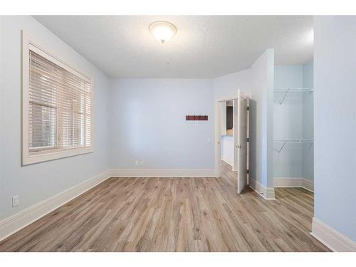 202-518 33 Street Nw, Calgary, AB - Indoor Photo Showing Other Room