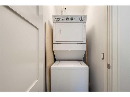 202-518 33 Street Nw, Calgary, AB - Indoor Photo Showing Laundry Room