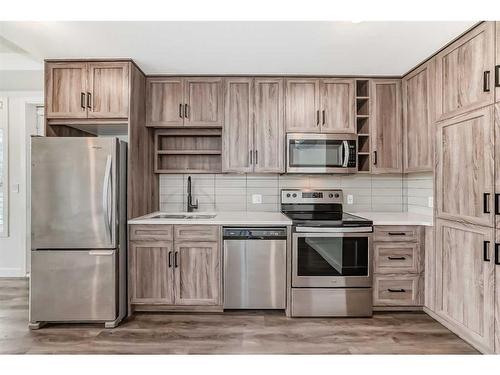 1114-350 Livingston Common Ne, Calgary, AB - Indoor Photo Showing Kitchen With Double Sink