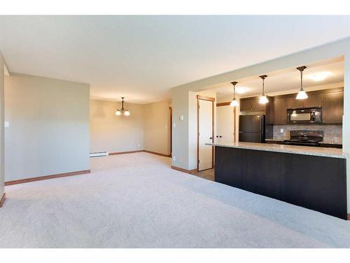 312-315 50 Avenue Sw, Calgary, AB - Indoor Photo Showing Kitchen