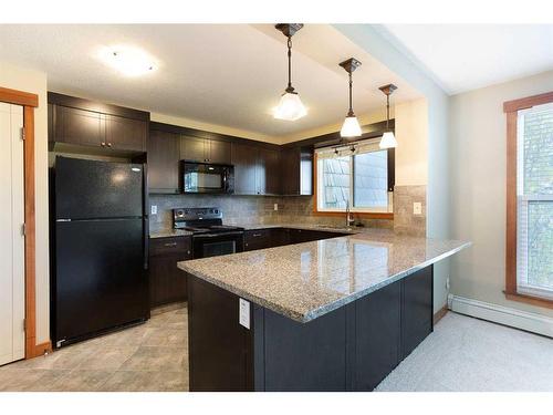 312-315 50 Avenue Sw, Calgary, AB - Indoor Photo Showing Kitchen