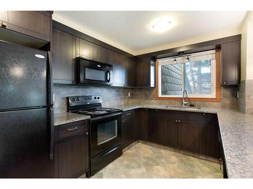 312-315 50 Avenue Sw, Calgary, AB - Indoor Photo Showing Kitchen