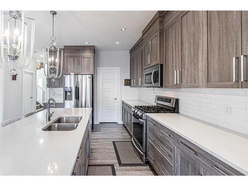 412 Legacy Boulevard Se, Calgary, AB - Indoor Photo Showing Kitchen With Stainless Steel Kitchen With Double Sink With Upgraded Kitchen