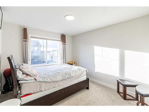 412 Legacy Boulevard Se, Calgary, AB - Indoor Photo Showing Bedroom