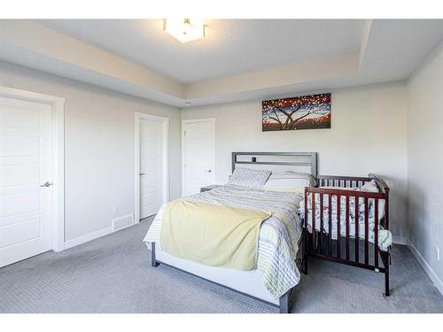 412 Legacy Boulevard Se, Calgary, AB - Indoor Photo Showing Bedroom