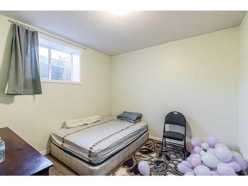 412 Legacy Boulevard Se, Calgary, AB - Indoor Photo Showing Bedroom