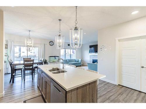 412 Legacy Boulevard Se, Calgary, AB - Indoor Photo Showing Kitchen With Double Sink With Upgraded Kitchen