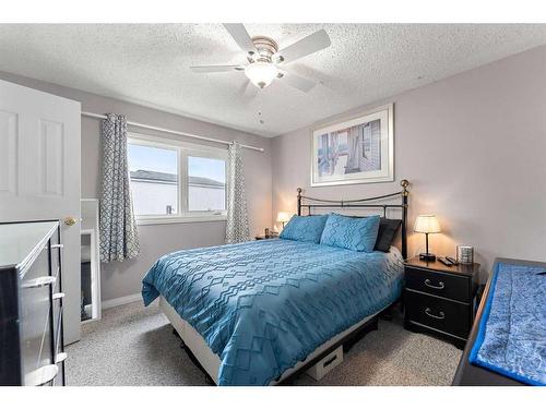 141 Spring Haven Mews Se, Airdrie, AB - Indoor Photo Showing Bedroom