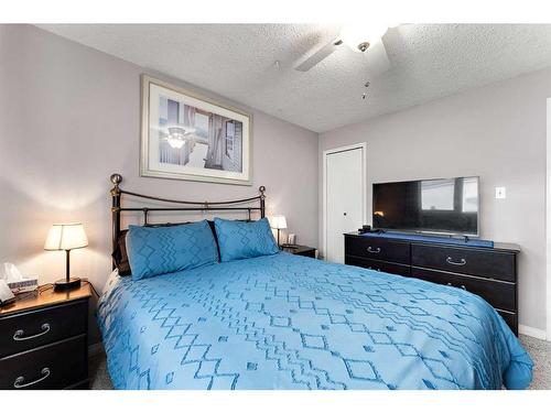 141 Spring Haven Mews Se, Airdrie, AB - Indoor Photo Showing Bedroom