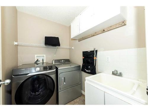 43 Evanston Rise Nw, Calgary, AB - Indoor Photo Showing Laundry Room