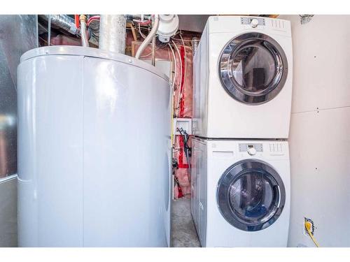 43 Evanston Rise Nw, Calgary, AB - Indoor Photo Showing Laundry Room