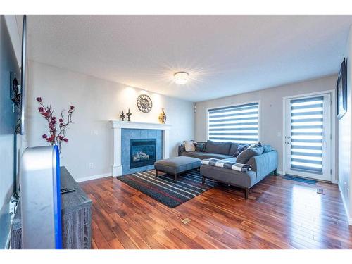 43 Evanston Rise Nw, Calgary, AB - Indoor Photo Showing Living Room With Fireplace