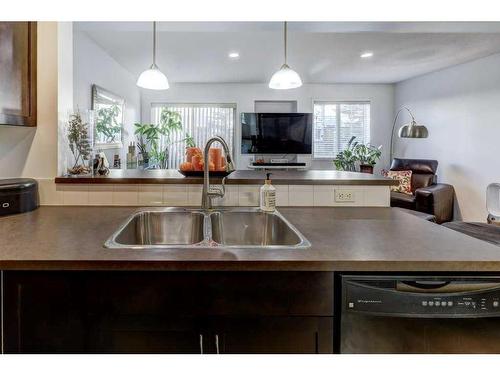 66 Country Village Villas Ne, Calgary, AB - Indoor Photo Showing Kitchen With Double Sink