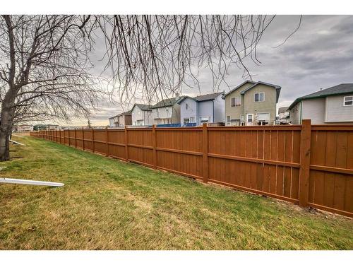 218 Taracove Place Ne, Calgary, AB - Outdoor With Backyard