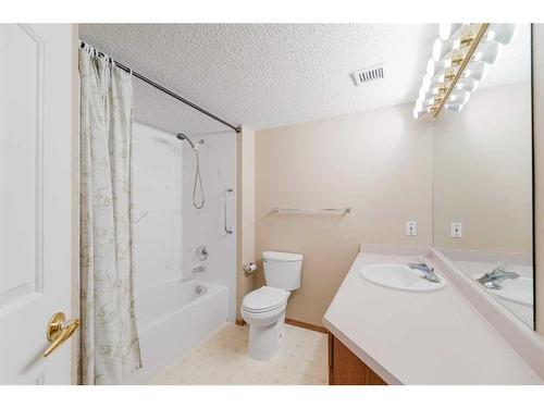 309-3309 Hawksbrow Point Nw, Calgary, AB - Indoor Photo Showing Bathroom