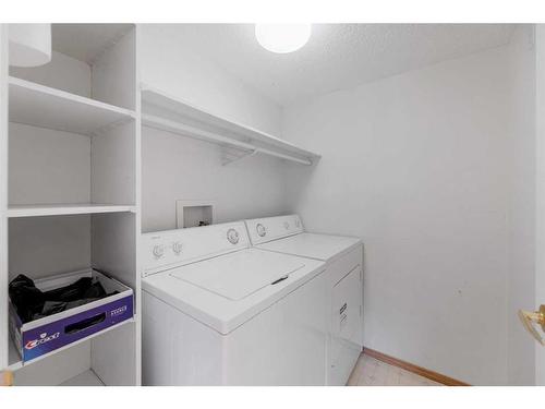 309-3309 Hawksbrow Point Nw, Calgary, AB - Indoor Photo Showing Laundry Room