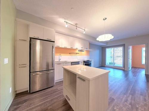 203-730 5 Street Ne, Calgary, AB - Indoor Photo Showing Kitchen